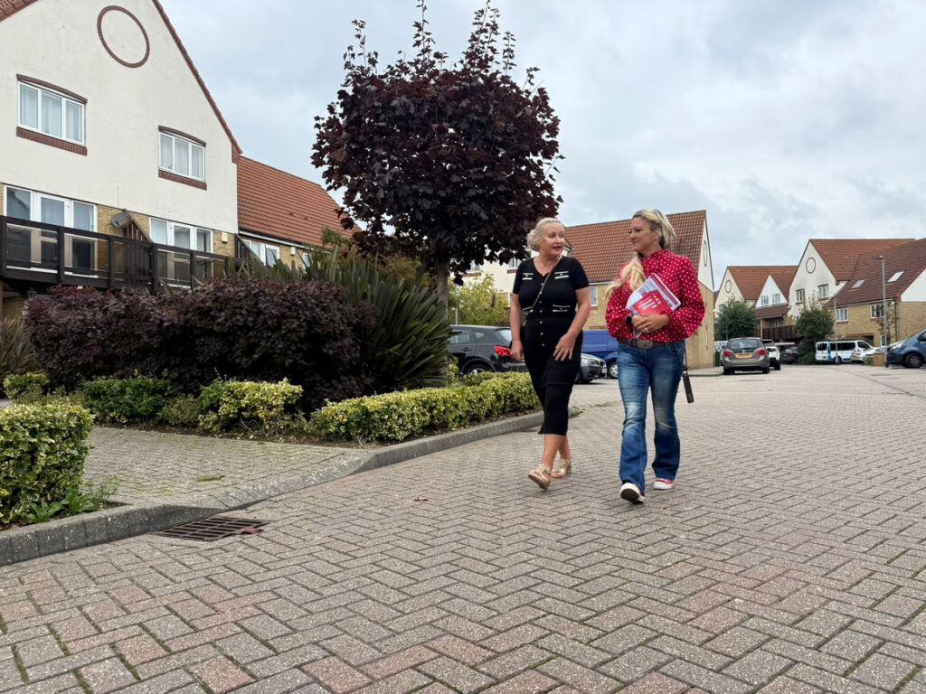 Sydna and Amanda visiting local residents